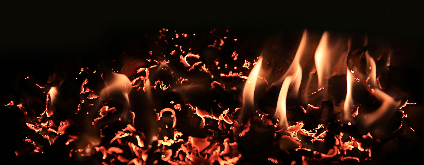 burning coals with flames
